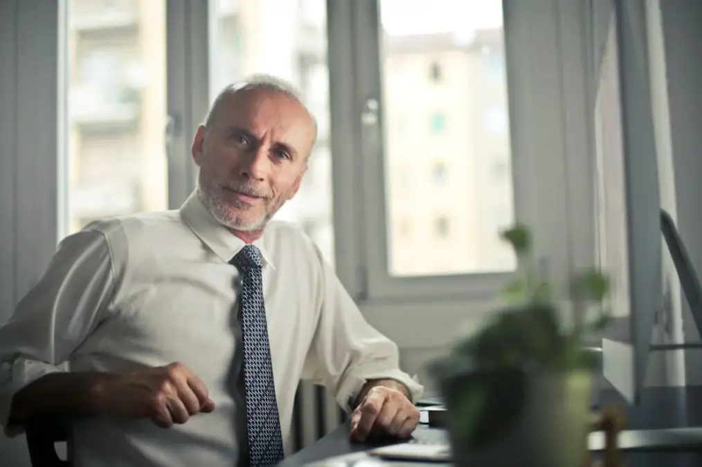 Elderly man in an office